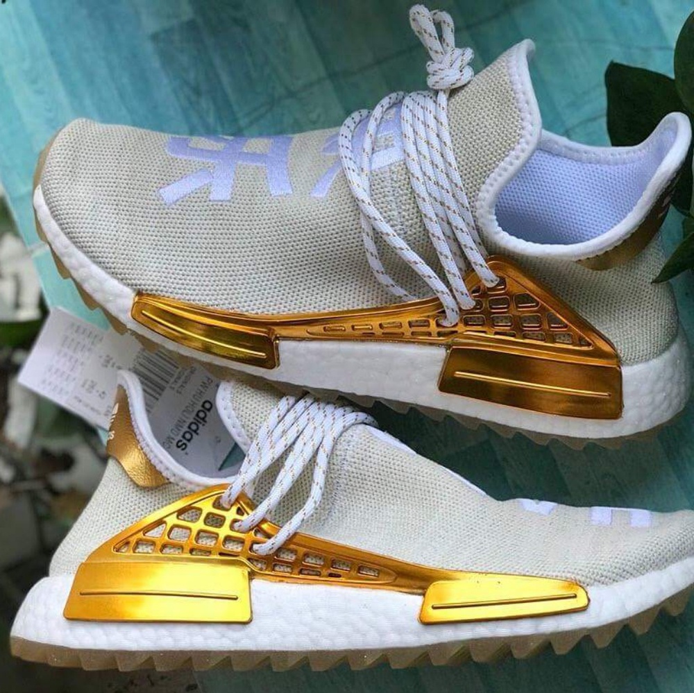 Human Race off white and gold shoes Adidas Pharrel